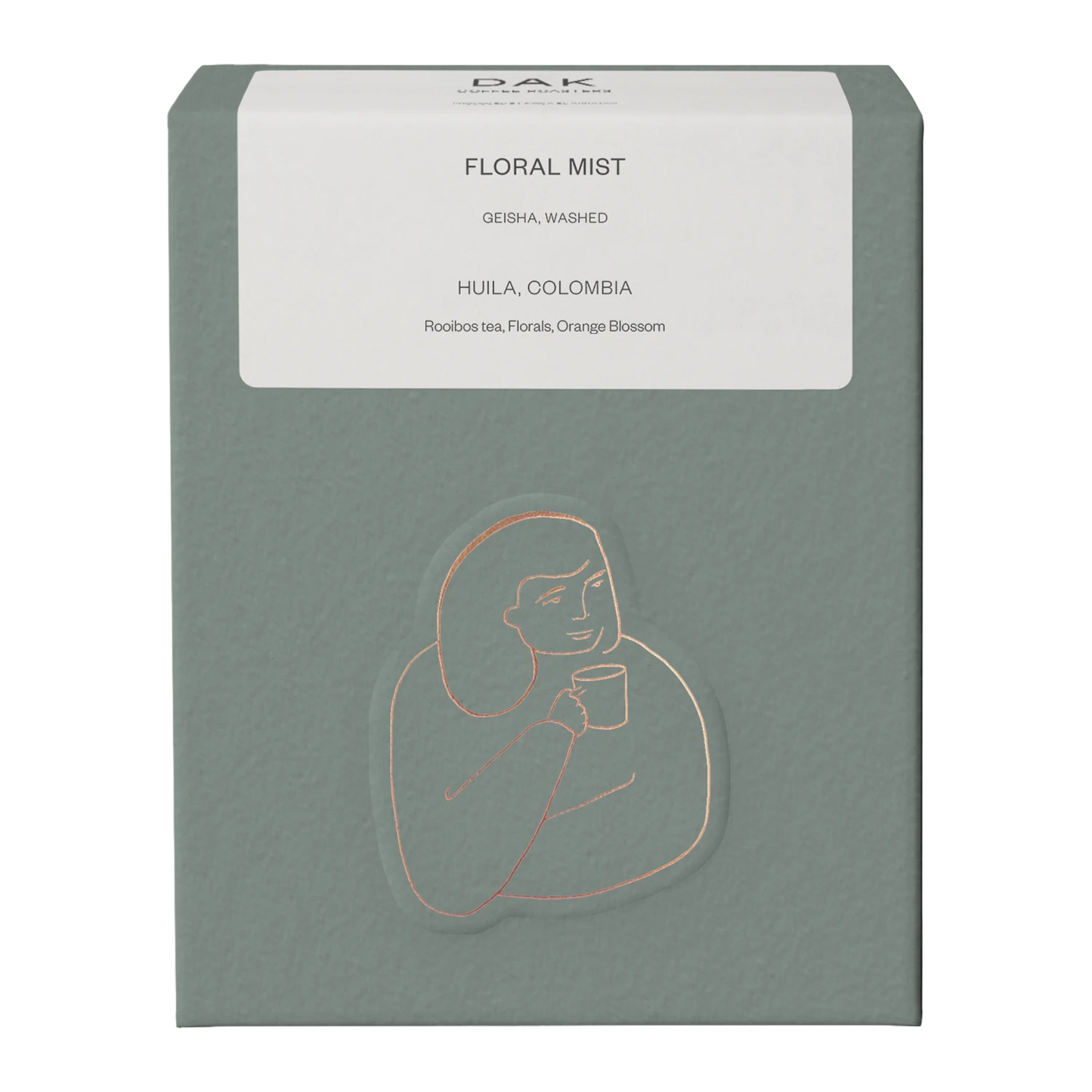 Green box of DAK Coffee Roasters Colombia Floral Mist Filter Whole Beans with gold on green drawing of a person