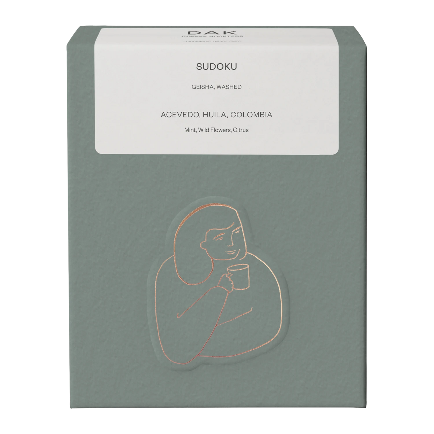 Green box of DAK Coffee Roasters Colombia Sudoku Filter Whole Beans with gold on green drawing of a person