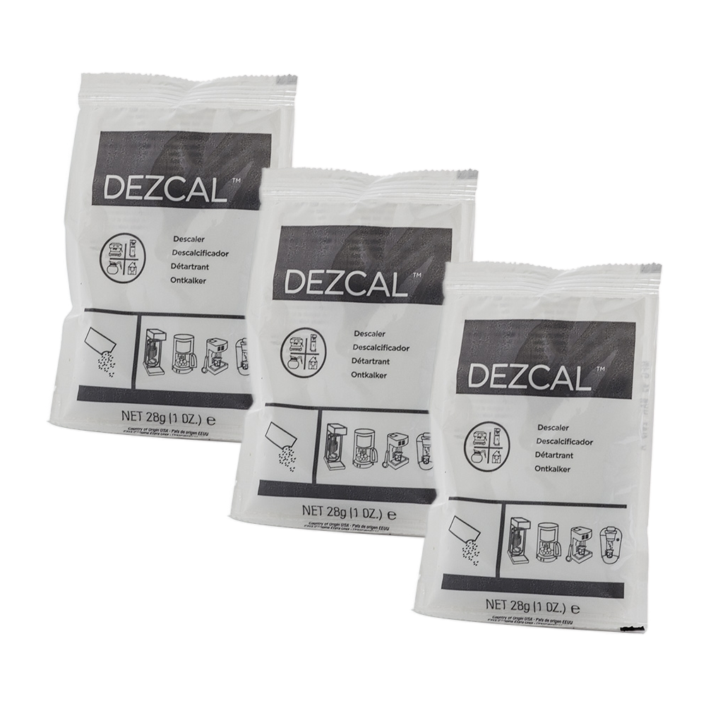 Three packages of descaling powder on white background