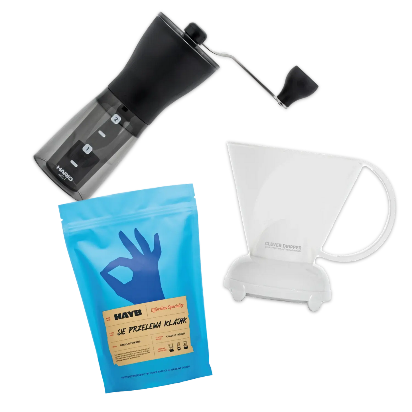 Hario Mini Mill coffee grinder, Hayb Sie Przelewa coffee bag, and Clever Dripper on a white background