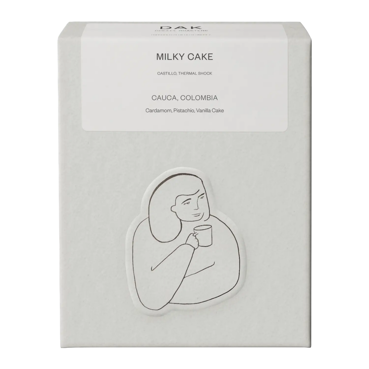 White box of DAK Coffee Roasters Milky Cake Filter Whole Beans with black on white drawing of a person
