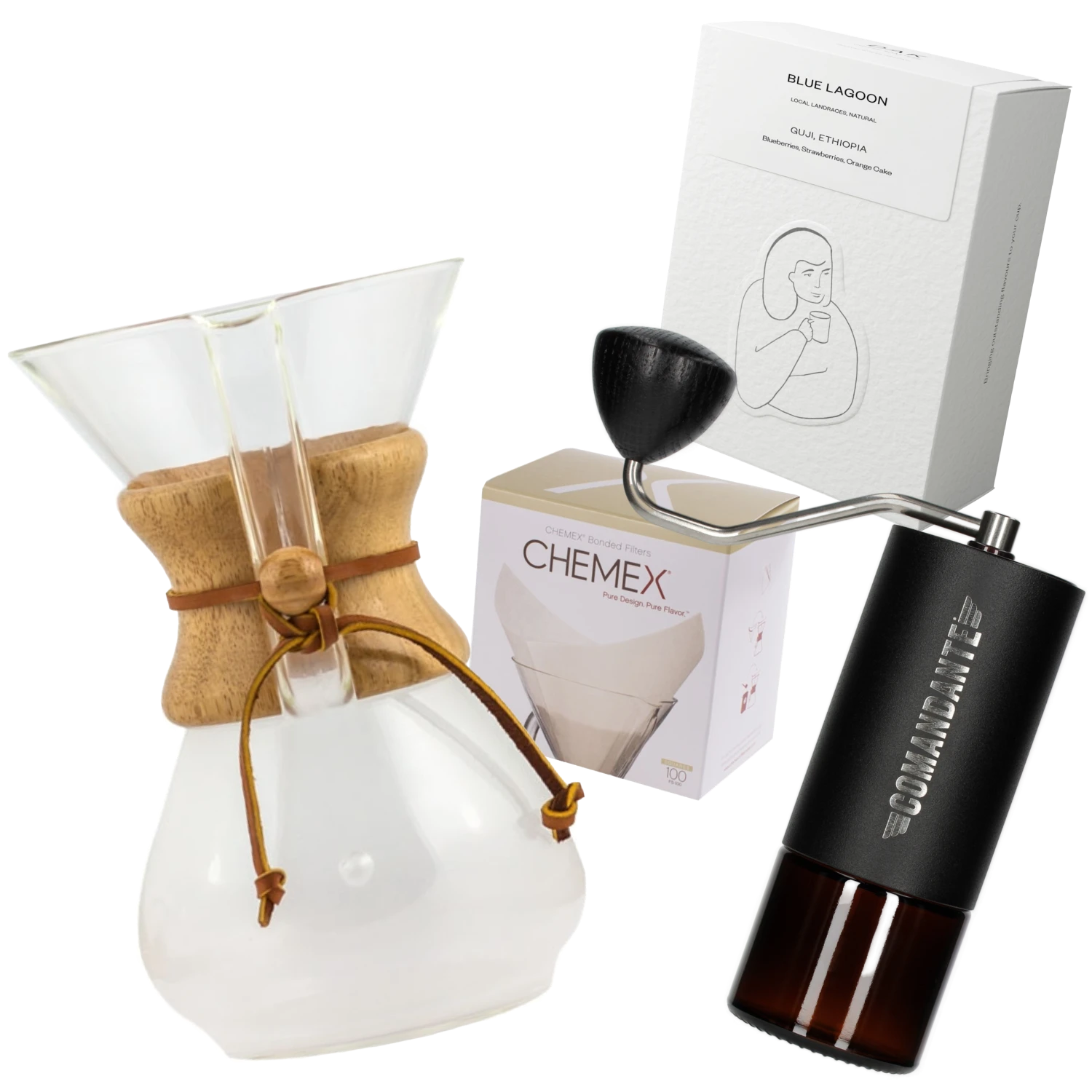 Chemex coffee maker with a filters box, DAK coffee bag and Commandante coffee grinder on a white background