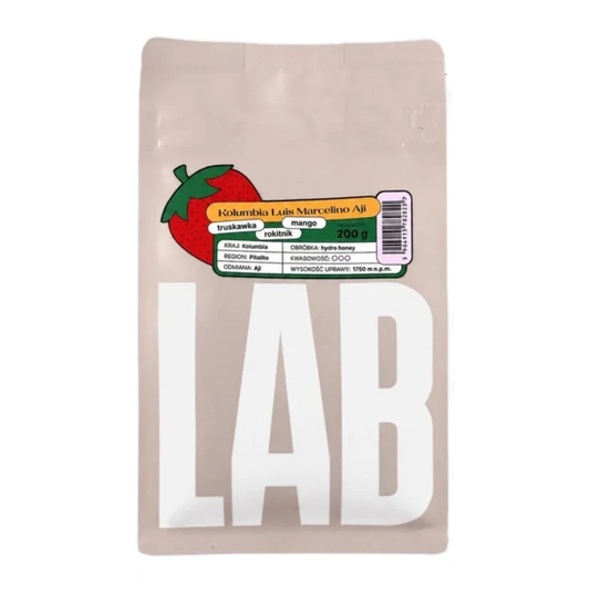Beige CoffeeLab bag Kolumbia Luis Marcelino Aji with large white LAB text and green red sticker  with strawberry