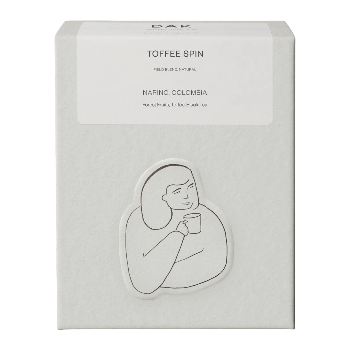 White box of DAK Coffee Roasters Toffee Spin Espresso Whole Beans with black on white drawing of a person