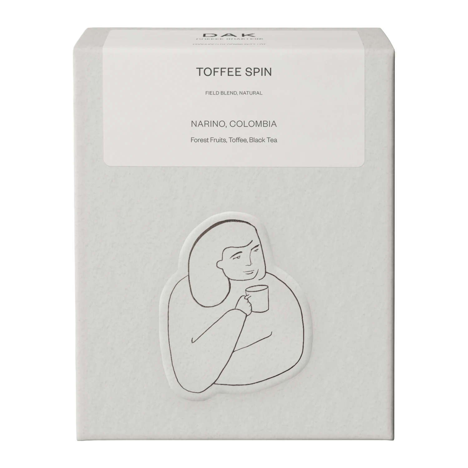 White box of DAK Coffee Roasters Toffee Spin Espresso Whole Beans with black on white drawing of a person