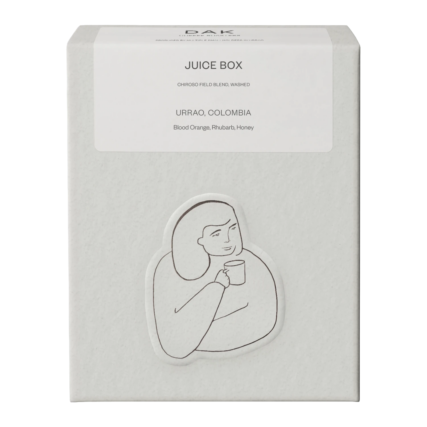 White box of DAK Coffee Roasters Juicy Box Filter Whole Beans with black on white drawing of a person