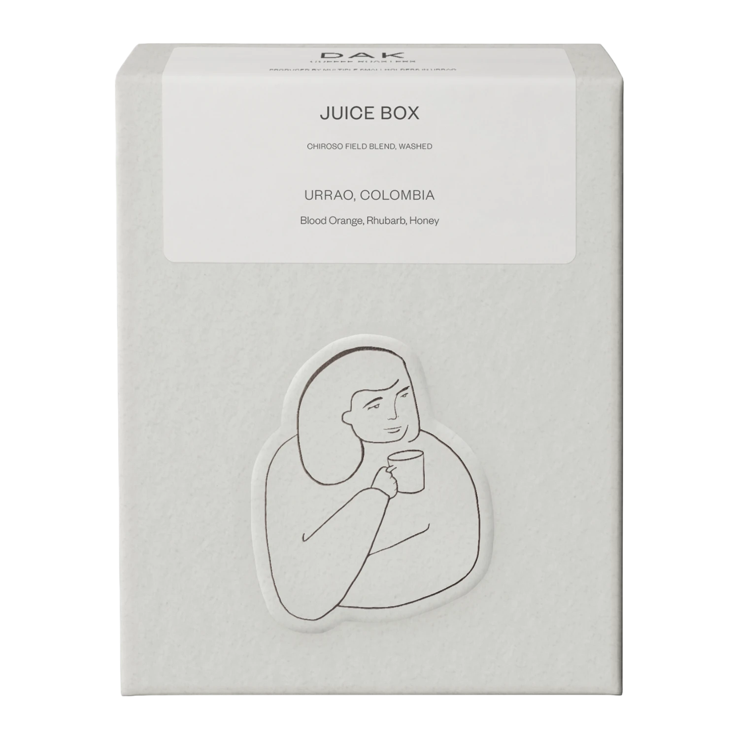 White box of DAK Coffee Roasters Juicy Box Filter Whole Beans with black on white drawing of a person