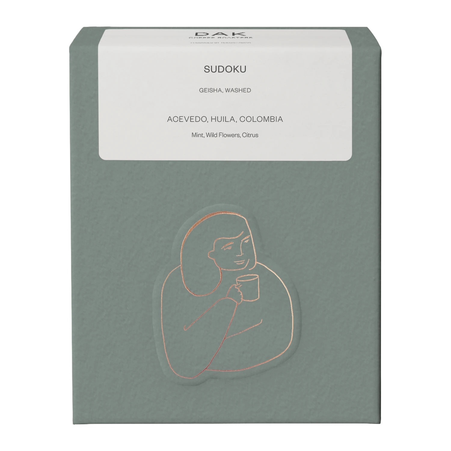 Green box of DAK Coffee Roasters Colombia Sudoku Filter Whole Beans with gold on green drawing of a person
