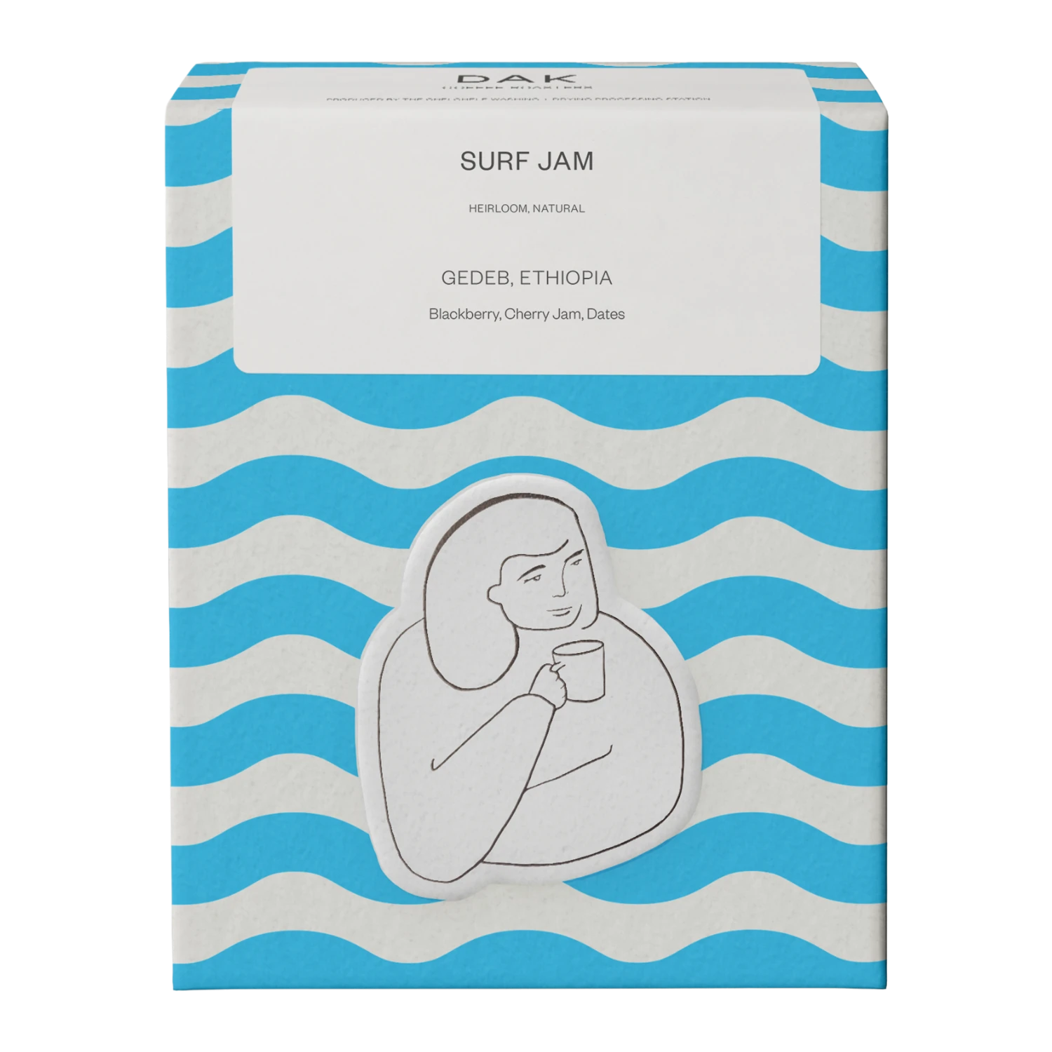 Blue and white wavy box of DAK Coffee Roasters Surf Jam Gedeb Ethiopia Whole Beans with a black outline drawing of a person holding a mug