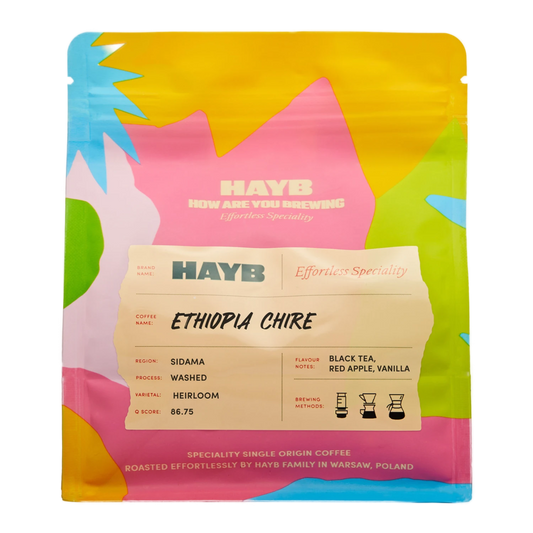 Colorful coffee package with 'HAYB' branding and coffee details on a white background