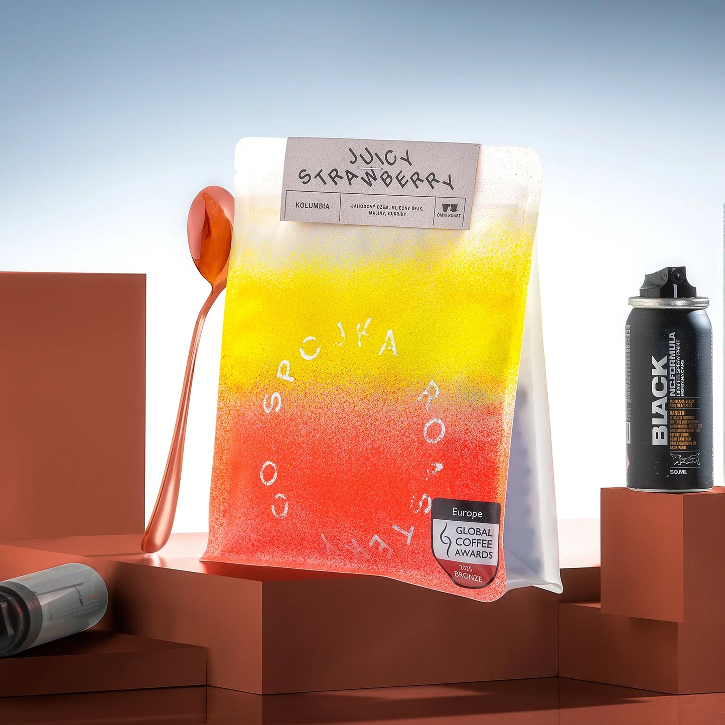 Gradient coffee bag with branding on a geometric background