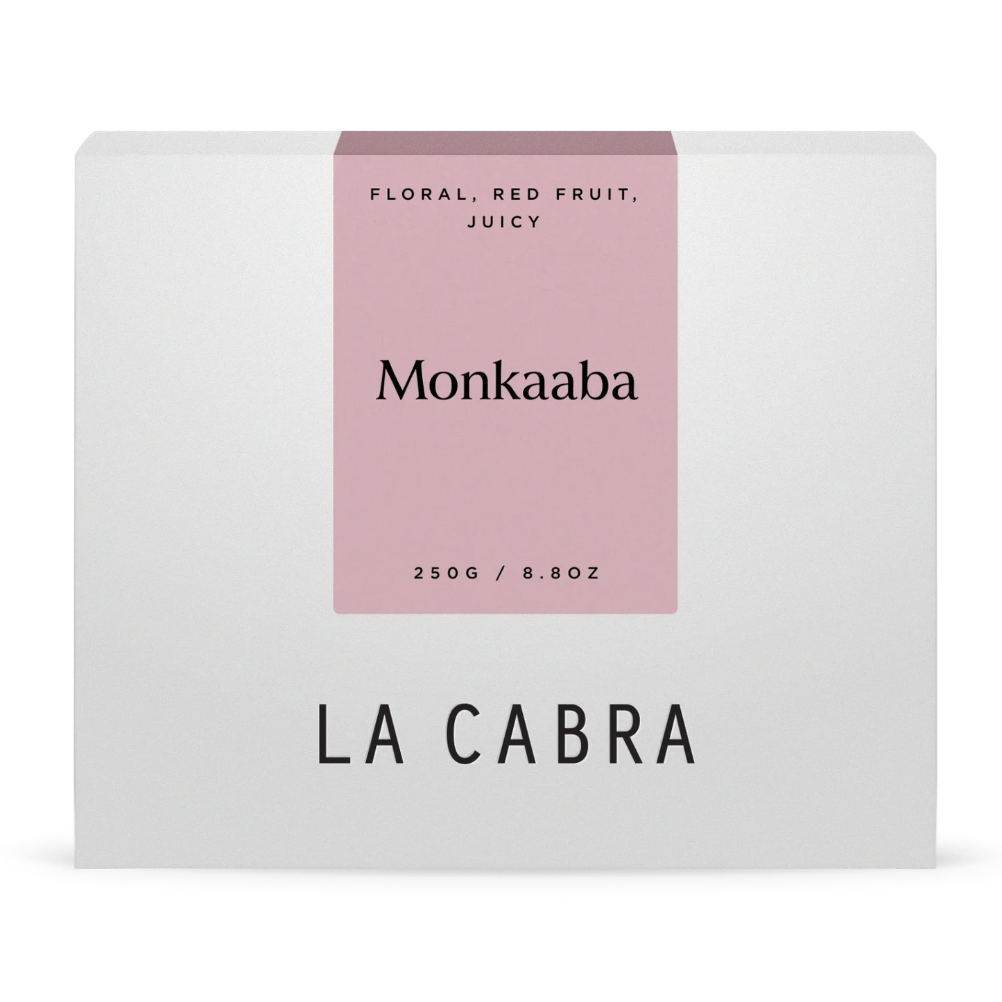La Cabra "Monkaaba" kaffeförpackning med vit bakgrund och ljusrosa etikett.