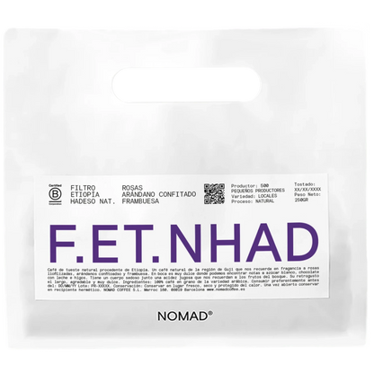 Vit Nomad Coffee-påse Etiopien Hadeso Nat. Filter 250g med stor blå F.ET.NHAD-text