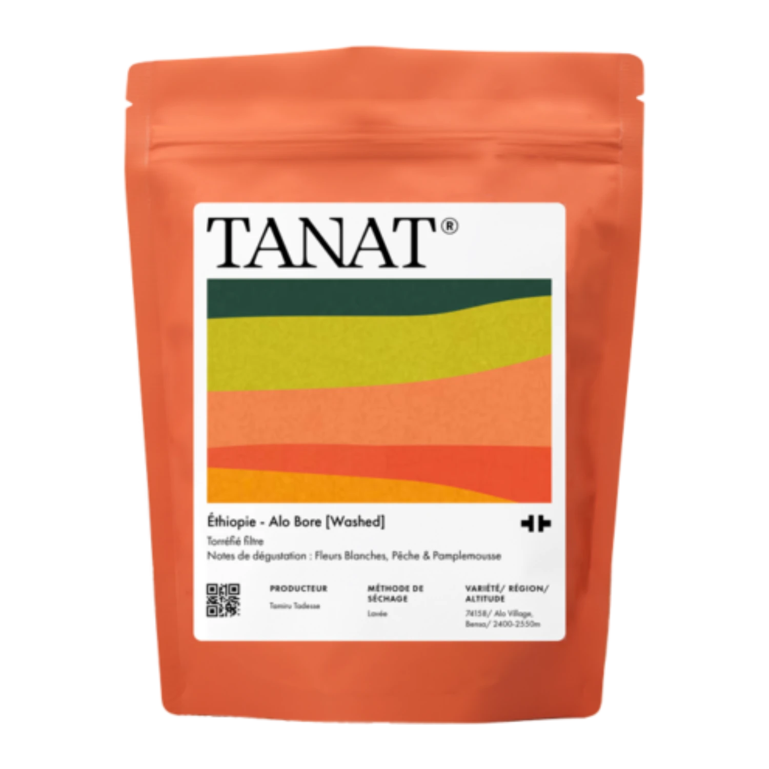 En ståpåse med TANAT Etiopien - Alo Bore (Washed), med en ljus orangeröd påse med en stor vit etikett som innehåller en färgglad våggrafik.