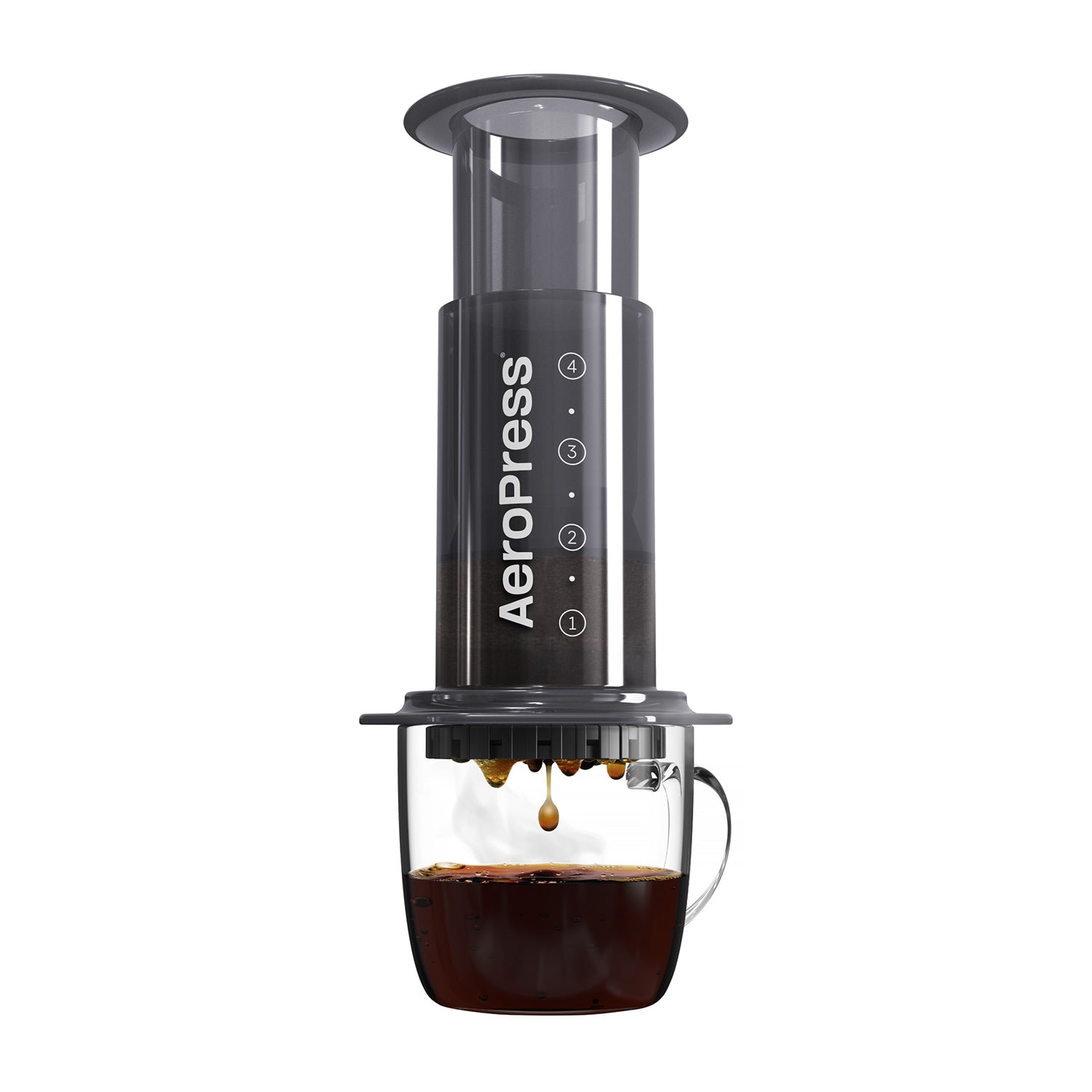 AeroPress Original brewing coffee directly into a glass cup with steam.