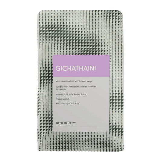 A single bag of Gichathaini coffee from Coffee Collective, featuring a textured silver-gray pouch with a central lavender label and white text.