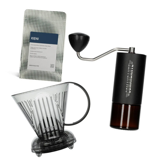 Commandante coffee grinder, Coffee Collective filter coffee bag, and white Transluscent Gray Clever Dripper on a white background