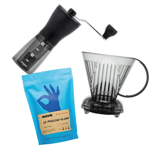 Hario Mini Mill coffee grinder, Hayb Sie Przelewa coffee bag, and Clever Dripper Transluscent Gray on a white background