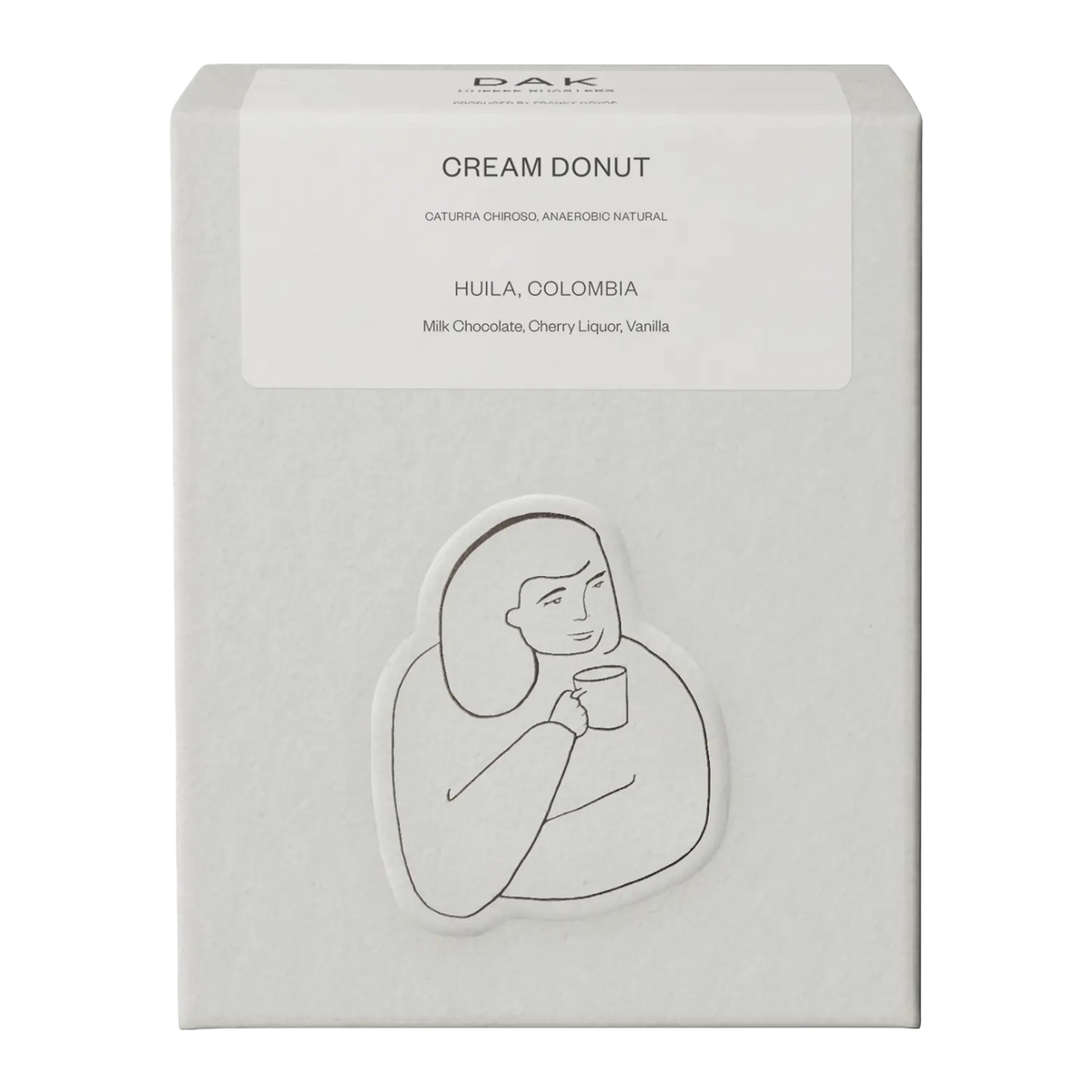 White box of DAK Coffee Roasters Cream Donut Filter Whole Beans with black on white drawing of a person
