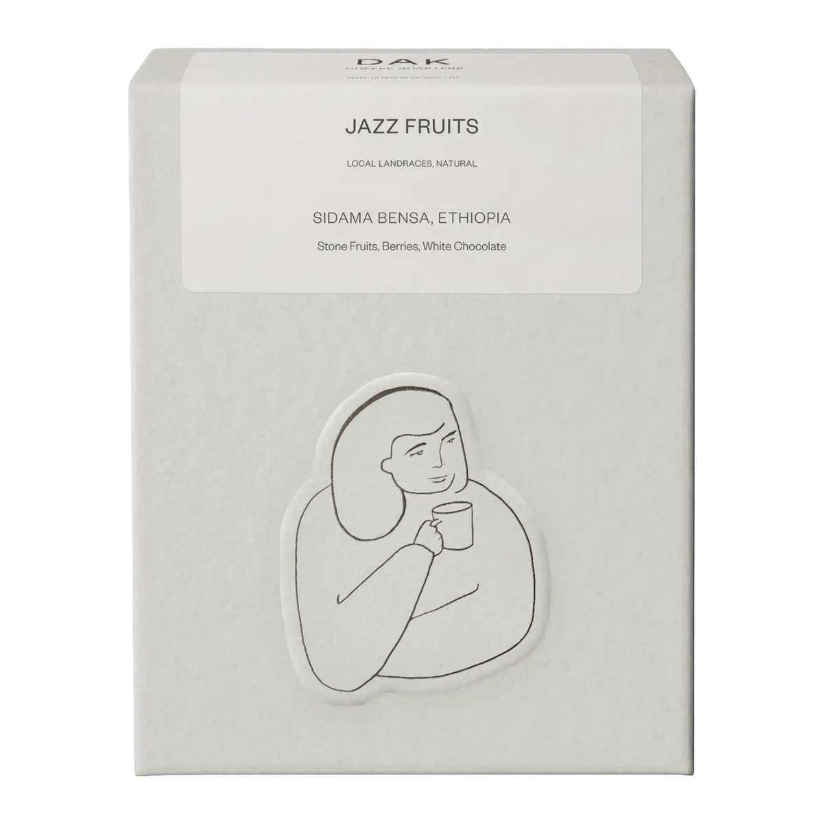 White box of DAK Coffee Roasters Jazz Fruit Espresso Whole Beans with black on white drawing of a person