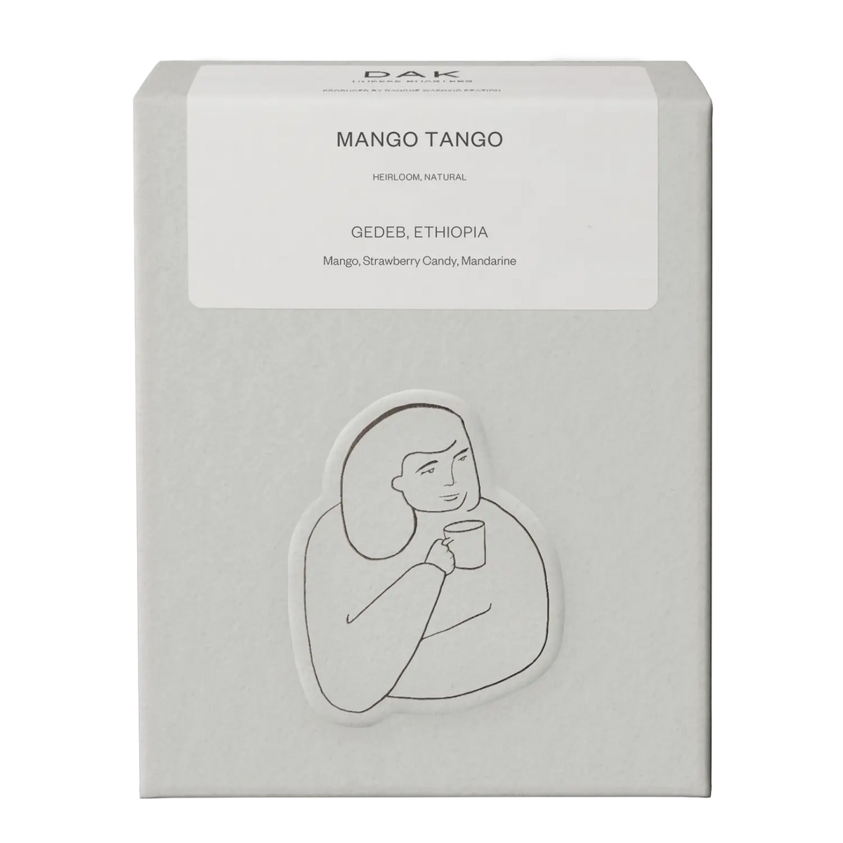 White box of DAK Coffee Roasters Mango Tango Filter Whole Beans with black on white drawing of a person
