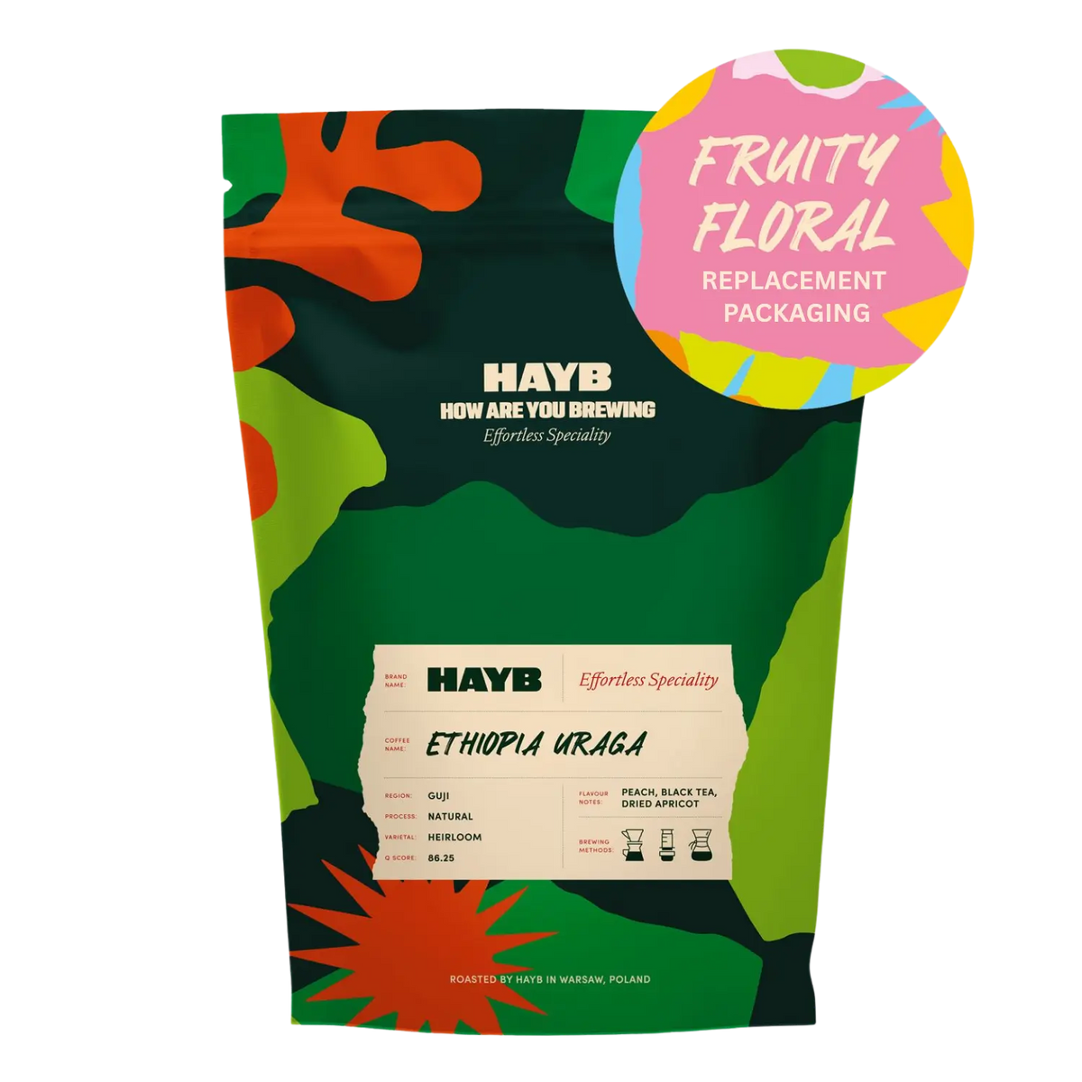 En stående påse med HAYB Etiopien Uruga kaffe med ett färgglatt kamouflagemönster i grönt, orange och svart. Ett rosa cirkulärt märke längst upp till höger lyder 'FRUITY FLORAL REPLACEMENT PACKAGING'.