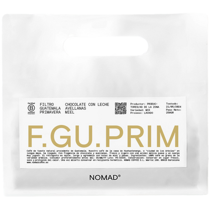 Vit Nomad Coffee-påse Guatemala Primavera filter 250g med stor guld F.GU.PRIM text