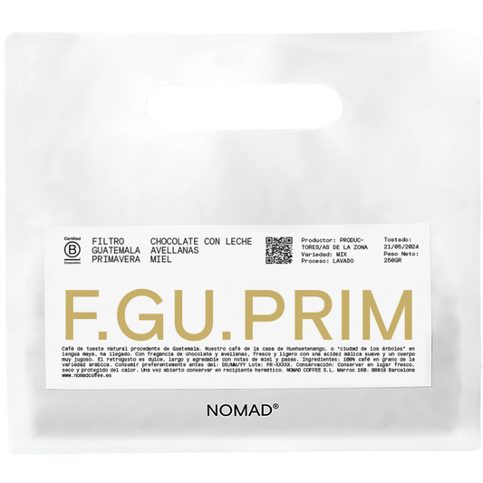 Vit Nomad Coffee-påse Guatemala Primavera filter 250g med stor guld F.GU.PRIM text