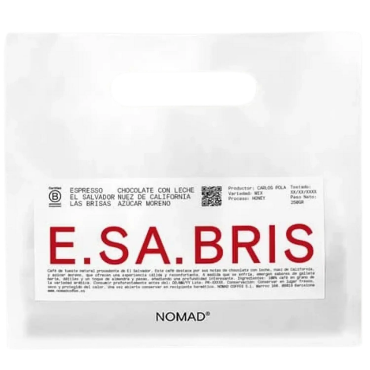 A white bag of NOMAD brand coffee with a prominent white label featuring the brand name 'E.SA.BRIS.