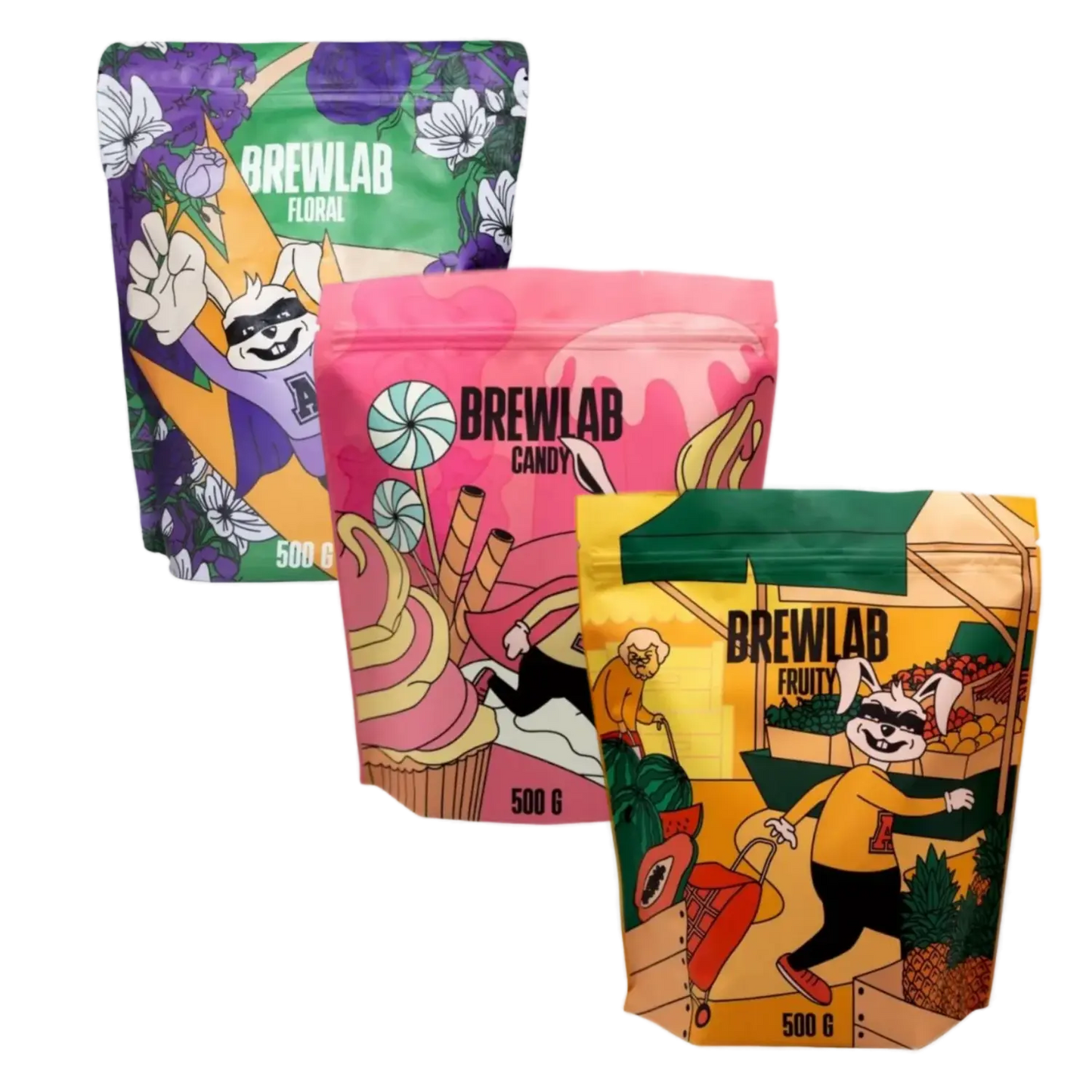 Tre färgglada påsar från COFFEELAB: Floral, Candy och Fruity uppställda på en vit bakgrund.
