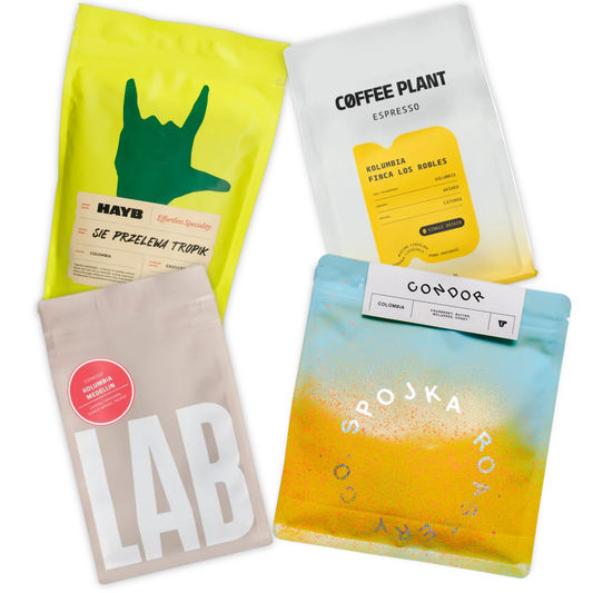 Four colorful coffee bags with different designs on a white background
