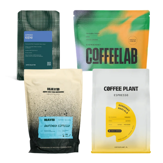 Four coffee bags from different brands on a white background