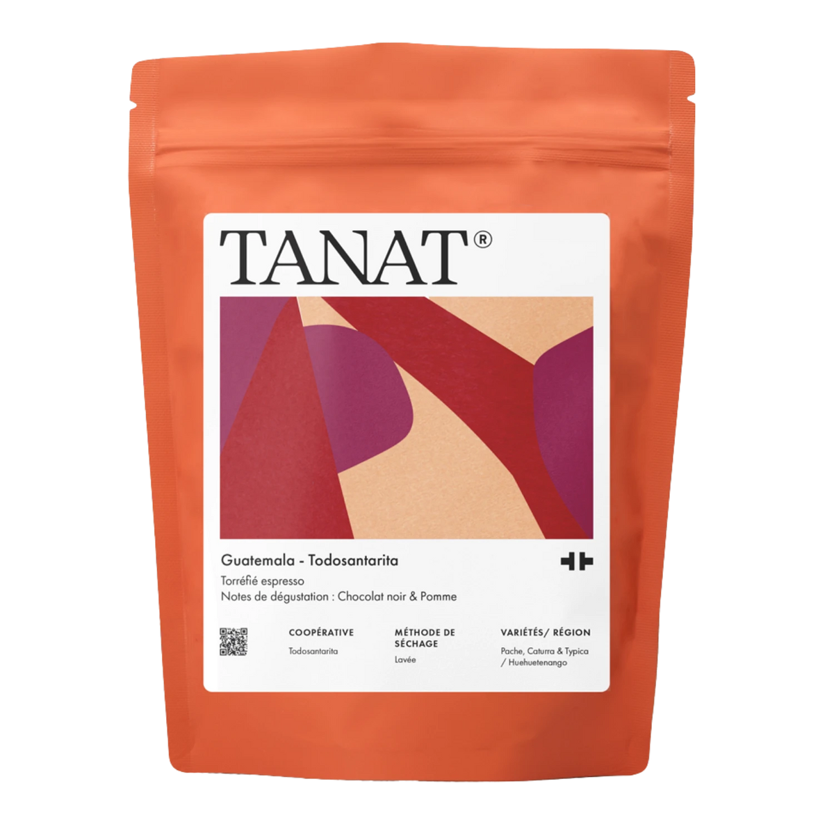 A stand-up pouch of TANAT Guatemala - Todosantarita coffee beans, featuring a bright orange body with a white label containing multicolor abstract shapes.