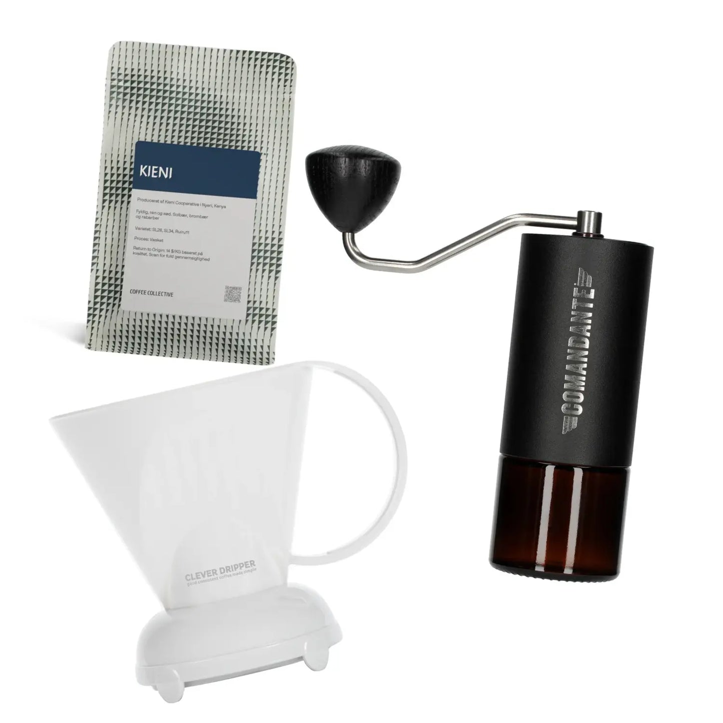 Commandante coffee grinder, Coffee Collective filter coffee bag, and white Clever Dripper on a white background